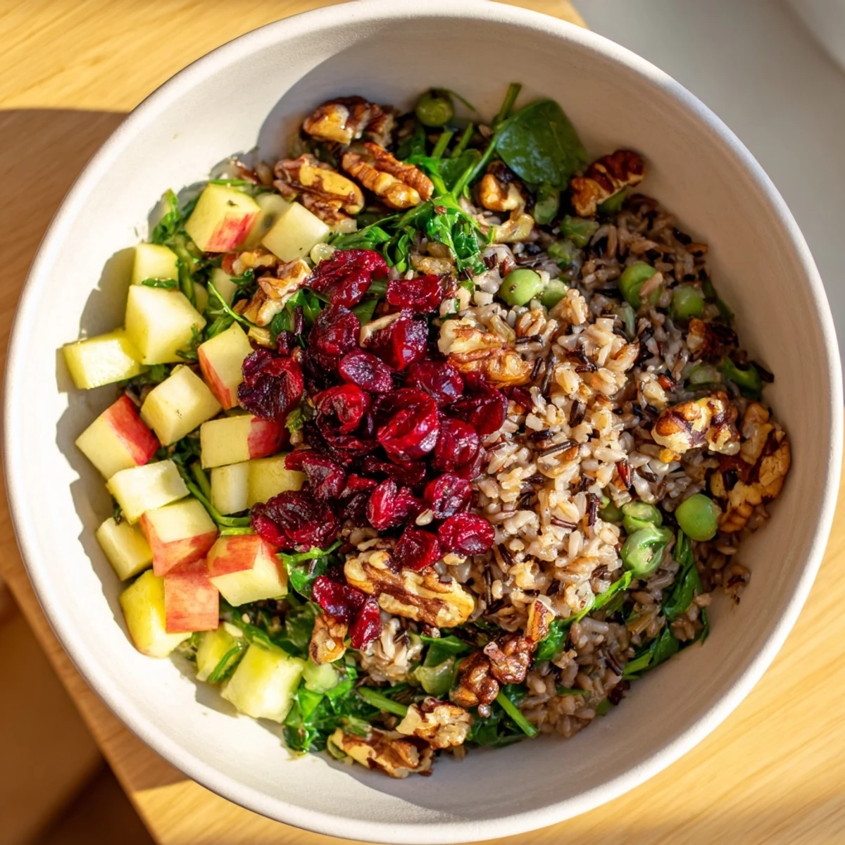 Enjoy this colorful Light Forest-Inspired Wild Rice and Cranberry Salad, overflowing with tender wild rice and tart cranberries.