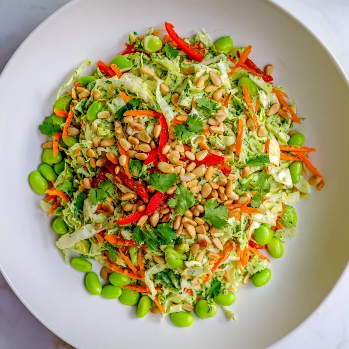 A bright bowl showcasing this Crunchy Cabbage and Edamame Salad, perfect for a fresh summer side.