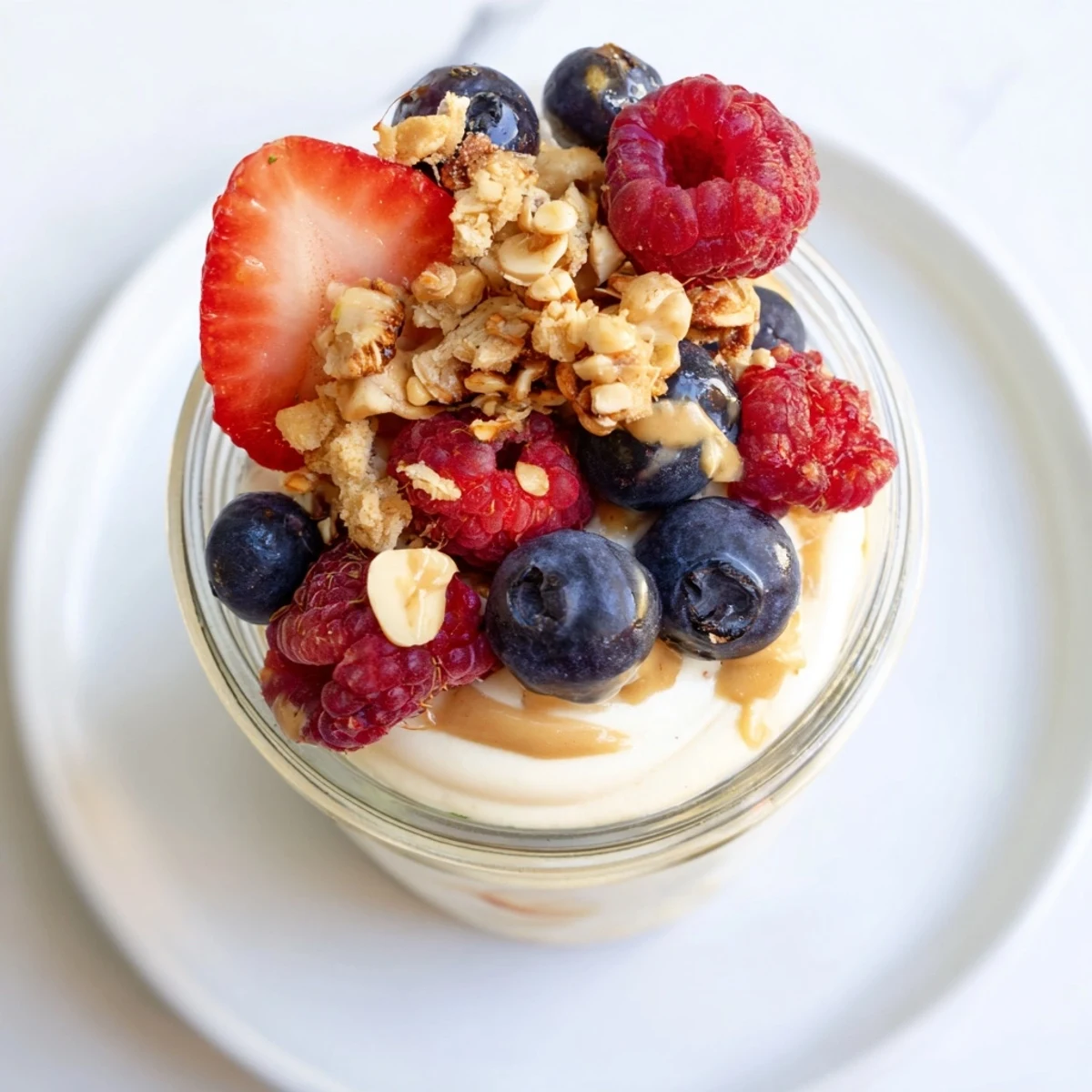 Enjoy a layered cashew butter yogurt parfait; the perfect, quick protein-packed breakfast treat.