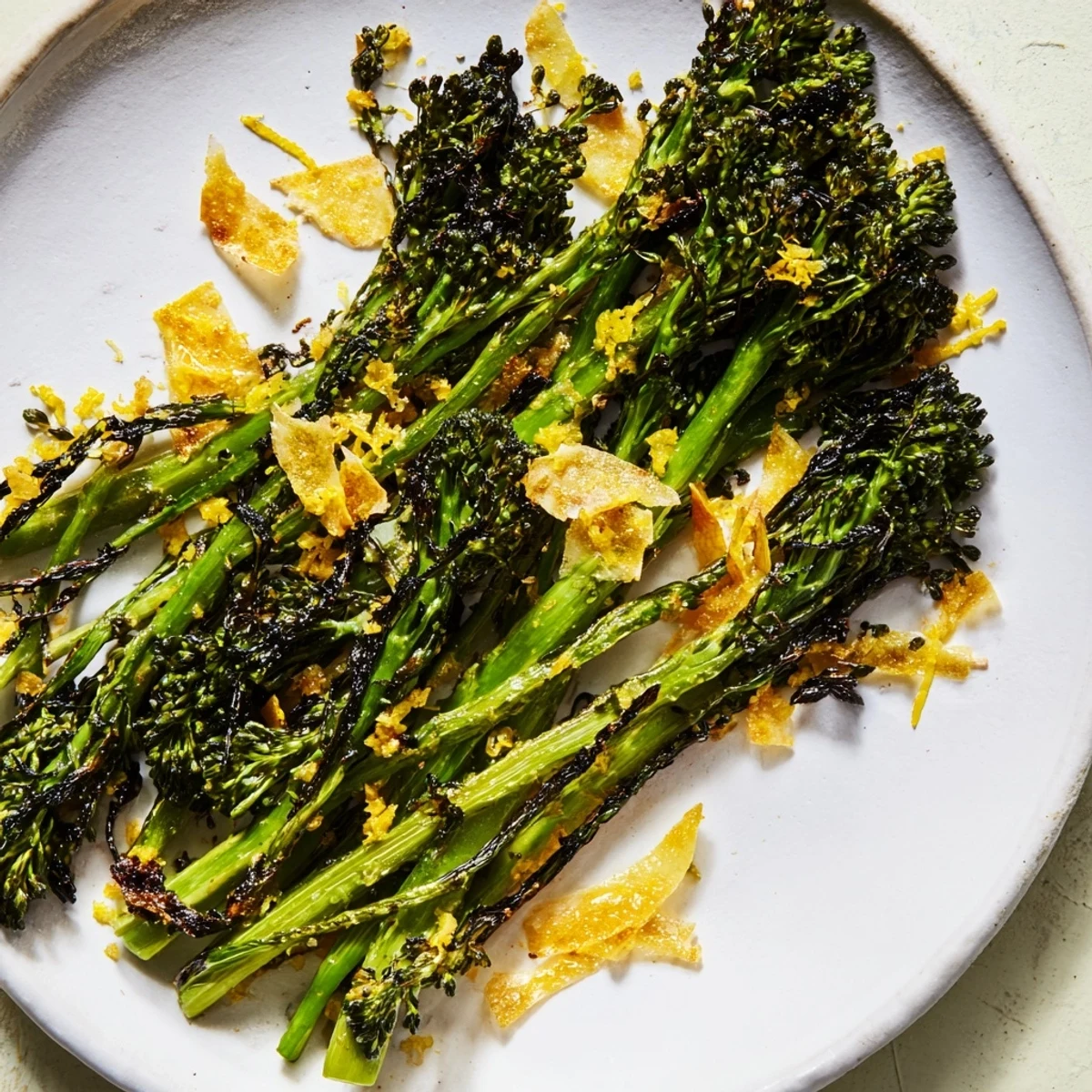 This fresh, bright broccolini salad features lemon-kissed, perfectly charred broccolini and shaved Parmesan.