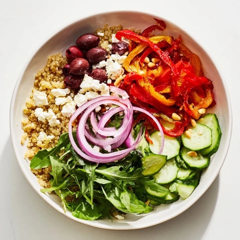 Mediterranean Grain Bowl—a colorful, wholesome dish with fluffy quinoa, fresh vegetables, and feta.