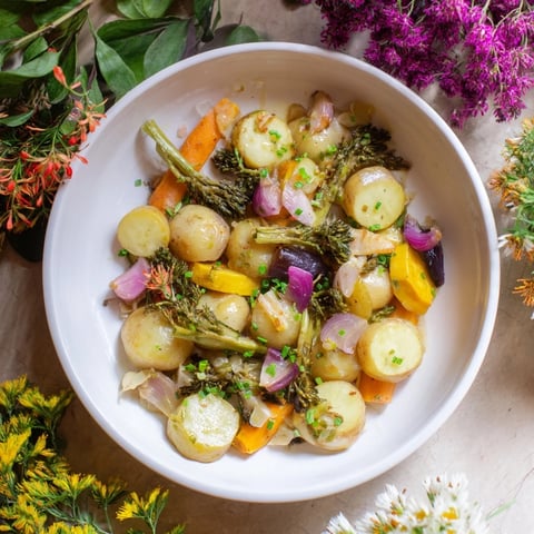 Golden-brown Light Herb & Fern-Inspired Roasted Vegetable Platter bursting with fresh herbs, a vibrant dish.