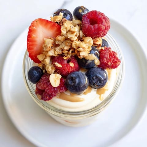 Enjoy a layered cashew butter yogurt parfait; the perfect, quick protein-packed breakfast treat.