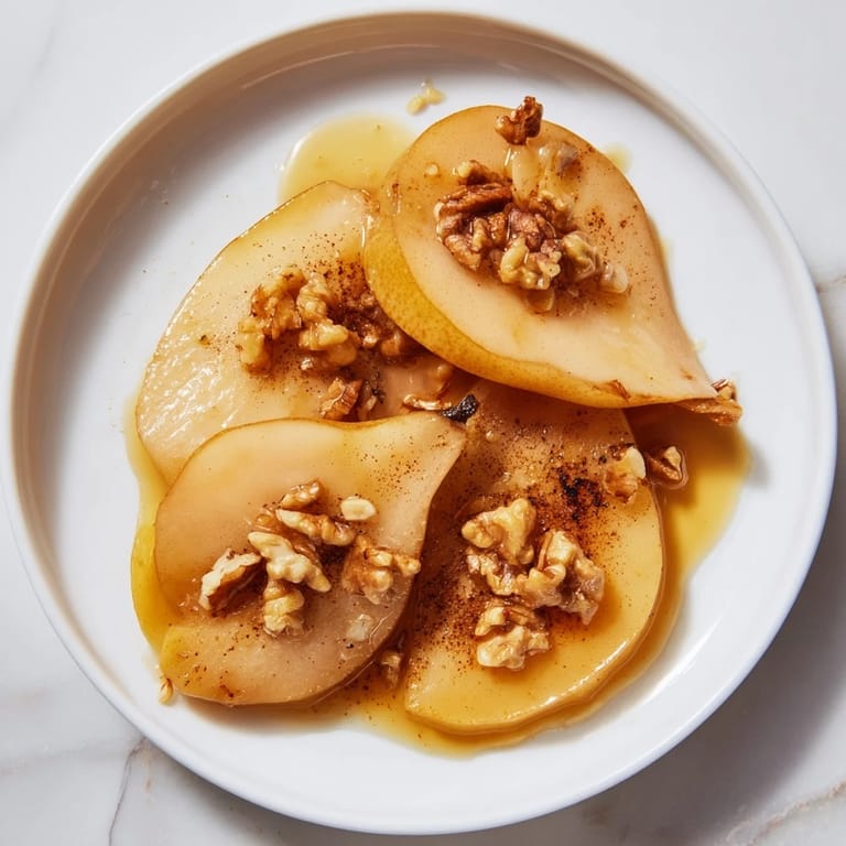 The inviting Maple-Warm Cozy Plate: Caramelized Pear and Walnut Bake, showcasing sweet pears and walnuts baking to perfection.